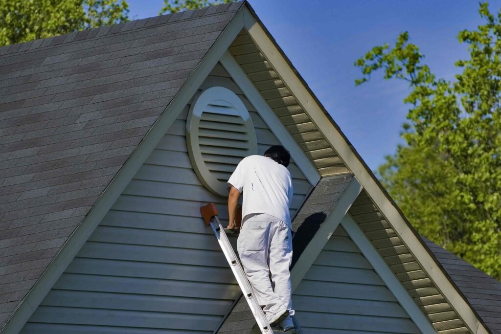 Property owner insuring investment property in Ajax, ON, highlighting the importance of proper coverage for home and rental assets